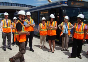 Learning more about CTfastrak at one of the stations. Check out the bus in the background!