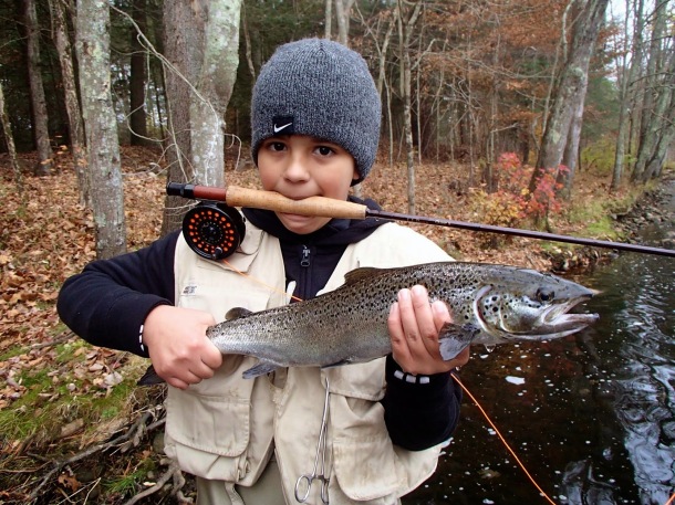 What it's all about! A young angler with a salmon raised at Kensignton Hatchery (photo credit: Bill Smyrnow)